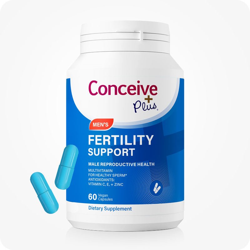 The image of the front side of a Conceive Plus Men Fertility Support bottle or pack on a white background. There are also two capsules on the lower left corner of the bottle